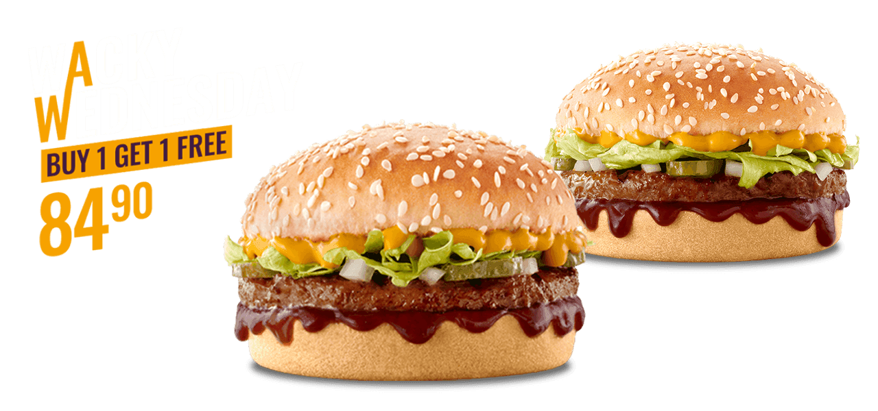 Two burgers on a grey surface